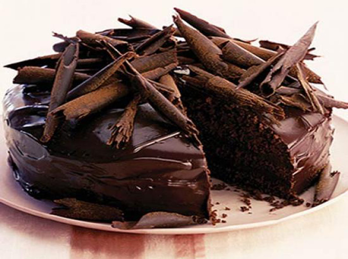 Receita de bolo de chocolate com calda de laranja